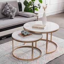 The lower table features rich textured walnut paper, while the smaller floating table boasts an elegant white carrara faux marble top. Do You Want A Coffee Table For Your Wonderful Space Our 2 Pieces Coffee Table Marble Top Table Decor Living Room Marble Top Coffee Table Coffee Table Design