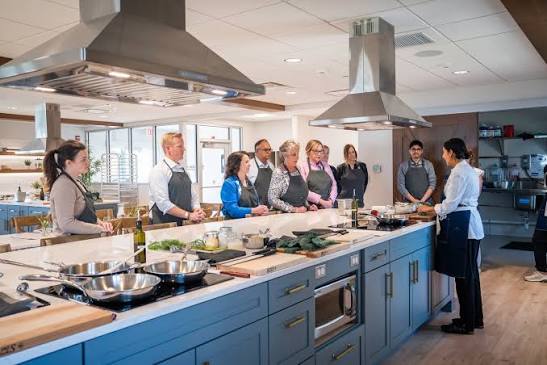 Professional clean community kitchen preparing hot food