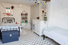 If you've ever wondered how to divide a kids bedroom, the easiest way to split up a room is to get a room divider to do all the hard work for you. Our Twin Bedroom For Boys Monochrome Kids Bedroom Decor