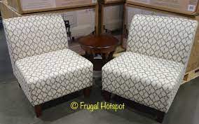 The table is made from engineered and solid wood, and has a round tabletop in a crisp white finish. Costco Sale Avenue Six Fabric Chair Accent Table 3 Pc Set 149 99