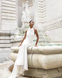Claudia McDade captures the beauty of juxtaposition in this fashion  pictorial. The historic New York Public Library and modern gowns by BB NYC  marry, creating a collection of imagery that tells a