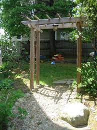 The diy arbor plan pictured here is for a metal gate on a timber frame arbor. Build A Wooden Garden Arbor 6 Steps With Pictures Instructables