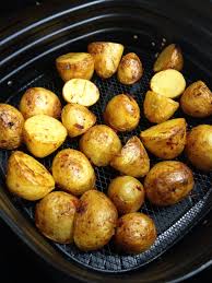 Roast Potatoes With Garlic And Chilli Harvest Kitchen Recipe Air Fryer Recipes Healthy Garlic Roasted Potatoes Baby Gold Potatoes Recipe