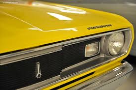 Image result for Yellow Gold 1970 Valiant