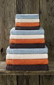 The louvre linen cabinet is a stylish choice that also helps save space. I M A G I N E Range Of Bath Linen Especially Designed For A Luxurious Wellness Experience Ba Orange Bathroom Decor Bathroom Towels Colors Orange Bathrooms