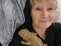 Hes at peace with the world. (Drop a pic of your beardies doing this )