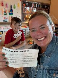 3rd grade practicing fact fluency while playing addition top it!!!