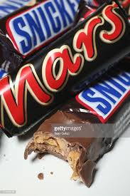 News Photo In This Photo Illustration Snickers And Mars Mars Chocolate Snickers Chocolate Mars Chocolate Bar