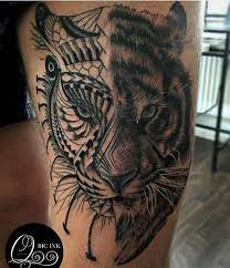 Oberschenkel Tatowieren Tigerkopf Tattoo In Schwarz Und Weiss Tigerkopf Tattoo Tattoo Elefanten Verruckten Tattoos
