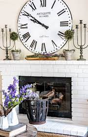 Oversized Clock Above A Fireplace Mantel How To Decorate A Mantel Fireplace Mantels Fireplace Decor