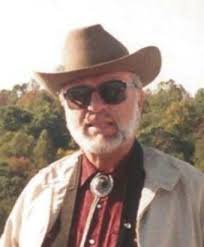RAYMOND K. SAYLOR