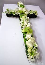 Loose lemon & lilac cross. Funeral Cross Flowers Shop Design Florist