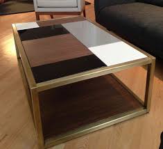 The coffee table bears a minimal bent wood design which is complimented with vertically placed brass. Custom Metal Modern Coffee Table Base By Andrew Stansell Design Custommade Com