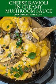 This Cheese Ravioli In Creamy Mushroom Sauce Is Made Easy Using Store Bought Ravioli And Made Extra Decadent Frozen Ravioli Recipes Cheese Ravioli Pasta Dishes