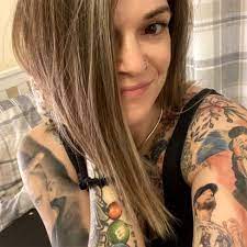 Eminem is an american celebrity. Eminem Fan Sets World Record For Most Musician Tattoos Bbc News