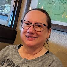 How to keep a book with metal rings from flopping open?