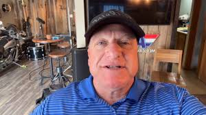 Kellie House hitting her drive almost onto the green