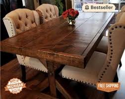 Round tables typically have a pedestal base and are great for fitting into a corner or squeezing extra guests around. Farmhouse Table Etsy