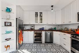 I have zero experience living with these floors and was wondering how they compare to hardwood in terms of upkeep and keeping. After Fun Tile Kitchen Remodels Before And After Popsugar Home Middle East Photo 9