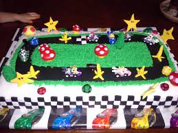 My first cake covered in fondant! Super Mario Mario Kart Racing Mario Kart Cake Mario Birthday Cake Mario Bros Birthday