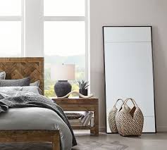 Find the nearest location at which to browse. Berke Oversized Iron Frame Floor Mirror Pottery Barn
