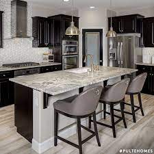 When you visit different home builders, like pulte homes, model homes, you may fall in love with all the available options. Design Inspiration A Gorgeous Modern Pulte Kitchen Featuring Black And Grays Pulte Homes Kitchen Design Pulte Kitchen Log Home Kitchens