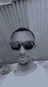 A young man pictured with his MUMAMA at Quiver Lounge Thika Road