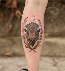 Bison head tattoo on the back. Bison Tattoo On The Left Calf