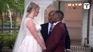 Cheeky father of bride gives short groom *** stool to kiss wife at altar