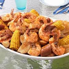 What Could Be More Fun Newspapers Covering The Table Fingertips Full Of Flavor No Food Brings People Together Qui Boiled Food Old Bay Shrimp Seafood Recipes
