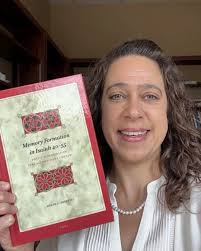Meet our authors! Today we are featuring Megan Roberts, who is proudly  holding a copy of her new book "Memory Formation in Isaiah 40–55". By  applying sociological memory studies and trauma theory,