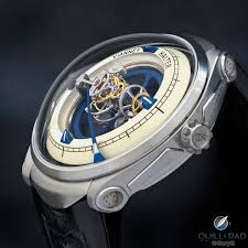 The version shown here has a round titanium case, with the sapphire crystal dome. How Not To Buy A Watch My Misadventure Quill Pad