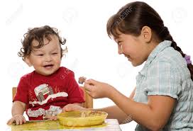 Stream tracks and playlists from younger brother official on your desktop or mobile device. The Big Sister Feeds The Younger Brother With A Porridge Stock Photo Picture And Royalty Free Image Image 5280838