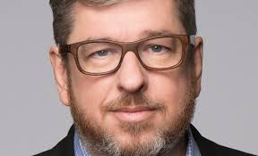 Lionsgate 'The Kingkiller Chronicle' Series: John Rogers As Showrunner