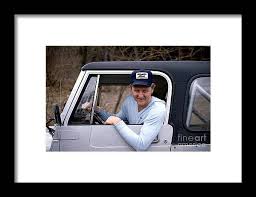 Larry Bird Poses In His Truck Framed Print By Ken Regan