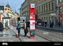 Prague, Czech Republic. Tram  streetcar approaching stop - people waiting  Stock Photo - Alamy