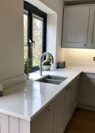 White is a very easy colour to live with, it's easy on the eye, doesn't demand attention, you won't get tired of looking at it and, best of all, there is an endless choice of coloured accessories that you can team with white without them clashing. Pale Grey Kitchen White Worktops Wall Colours Houzz Uk
