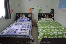 It's unexpected, and playing with scale (big bed, small room) can be a fun way to stick it to the design purists. 9. Organizing A Shared Boys Bedroom A Pretty Life In The Suburbs Shared Boys Rooms Small Boys Bedrooms Apartment Decorating College Bedroom