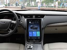 The trunk unlocks when you press the release button if the intelligent access transmitter is within 3 feet (1 meter) of the trunk. Ford Taurus Vignale Classy Luxury Sedan For The Middle Kingdom