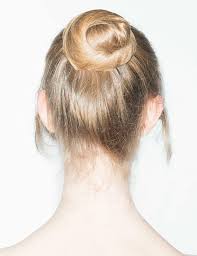 Create a braid on each side and use bobby pins to secure the strands of. How To Make A Hair Bun Understated Swirl Bun Tutorial Redken