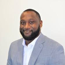 What pre-licensing course is best for an adjuster in Michigan?