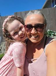 A Gleeful baby elephant makes a playdate with her favorite playmate