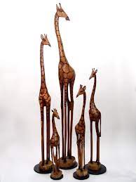 Maybe you would like to learn more about one of these? Olivewood Giraffe Artists Scattered Throughout Zimbabwe Mainly In Remote Rural Areas Create Mbare S Wood Sculptures Indig Giraffe Decor Giraffe Wooden Art