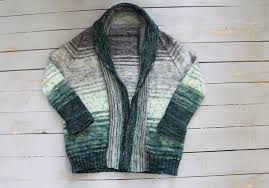 Starting at a single point and growing, shifting and fading into a piece that begs to be wrapped up in. The Feisty Redhead A New Knit Comfort Fade Cardigan