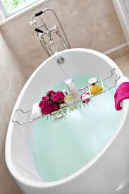 Bath caddy tray for tub: Oval Soaking Tub With Chrome Fixtures And Bath Caddy Hgtv