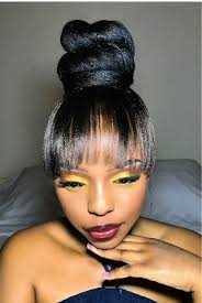 High Bun Tutorial with Bangs