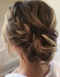 Thick dutch braids meet in a bun. 87 Stunning Braided Updo S For Your Next Event