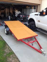 Haul master folding trailer pics / this folding trailer only takes up 24 in. Nice Folding Trailer Solves Storage And Transportation Issues Found It At Harbor Freight Assembly Required And Plywoo Kayak Trailer Trailer Diy Trailer Deck