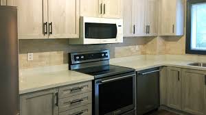 New hardware like hinges and pulls help you complete your cabinet upgrade. What Is Kitchen Cabinet Refacing How It S Done The Home Depot Canada