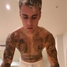 Browse 50 selena gomez tattoo stock photos and images available, or start a new search to explore more stock photos and images. Shirtless Justin Bieber Flaunts Toned Body His Selena Gomez Tattoo Plays Peekaboo Grooves With Hailey Later Pinkvilla